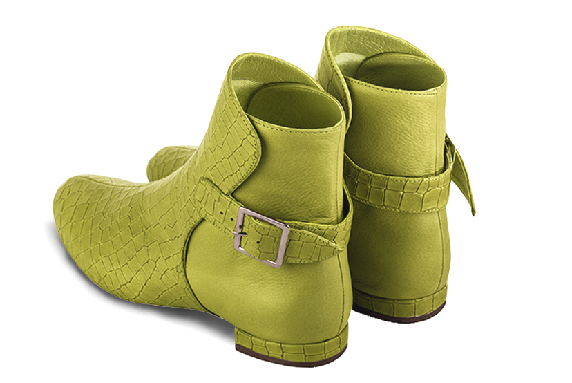 Pistachio green women's ankle boots with buckles at the back. Round toe. Flat block heels. Rear view - Florence KOOIJMAN